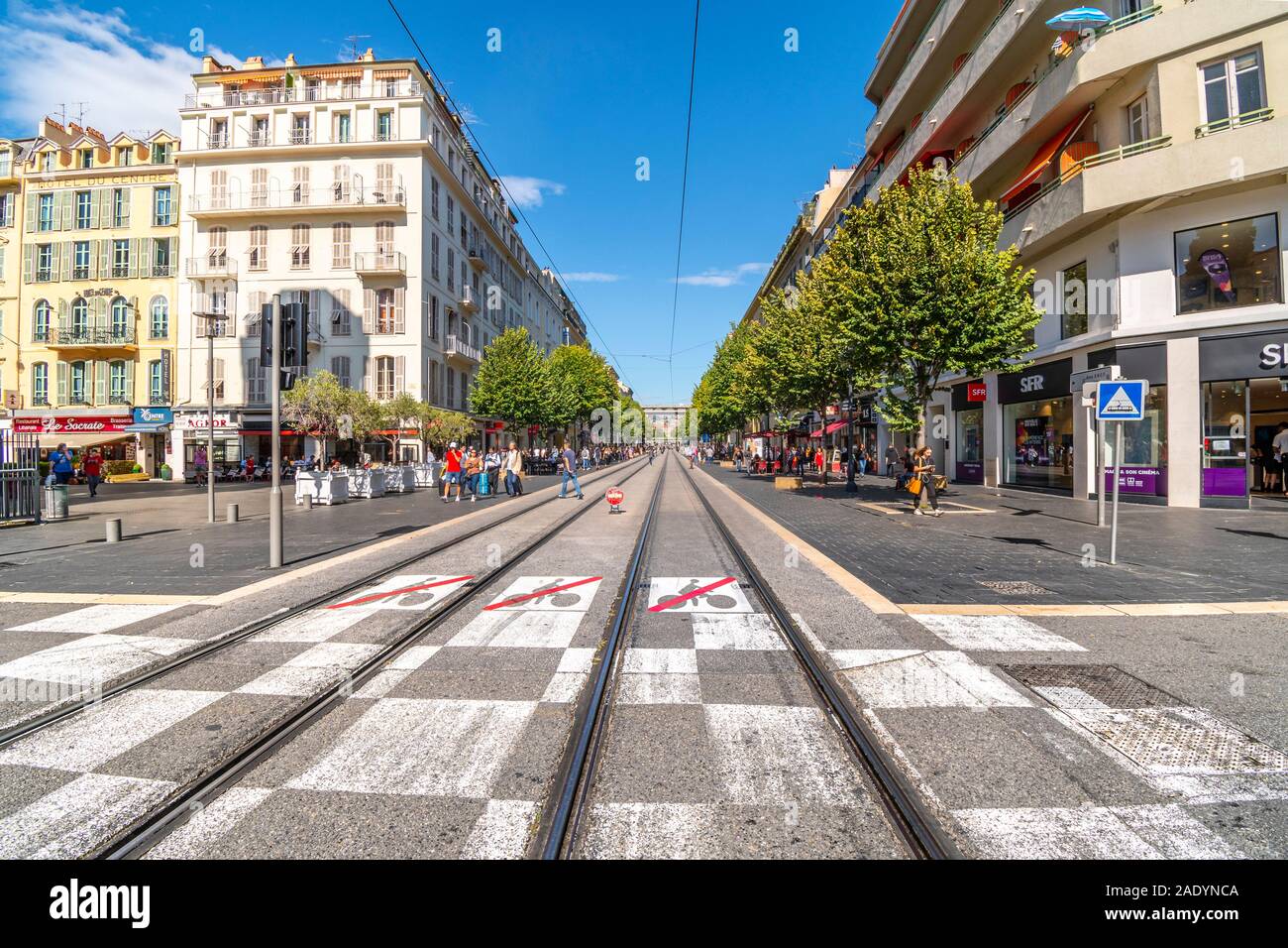 French locals and tourists enjoy an afternoon on Avenue Jean Medecin, the  main street and tramway through Nice, France Stock Photo - Alamy
