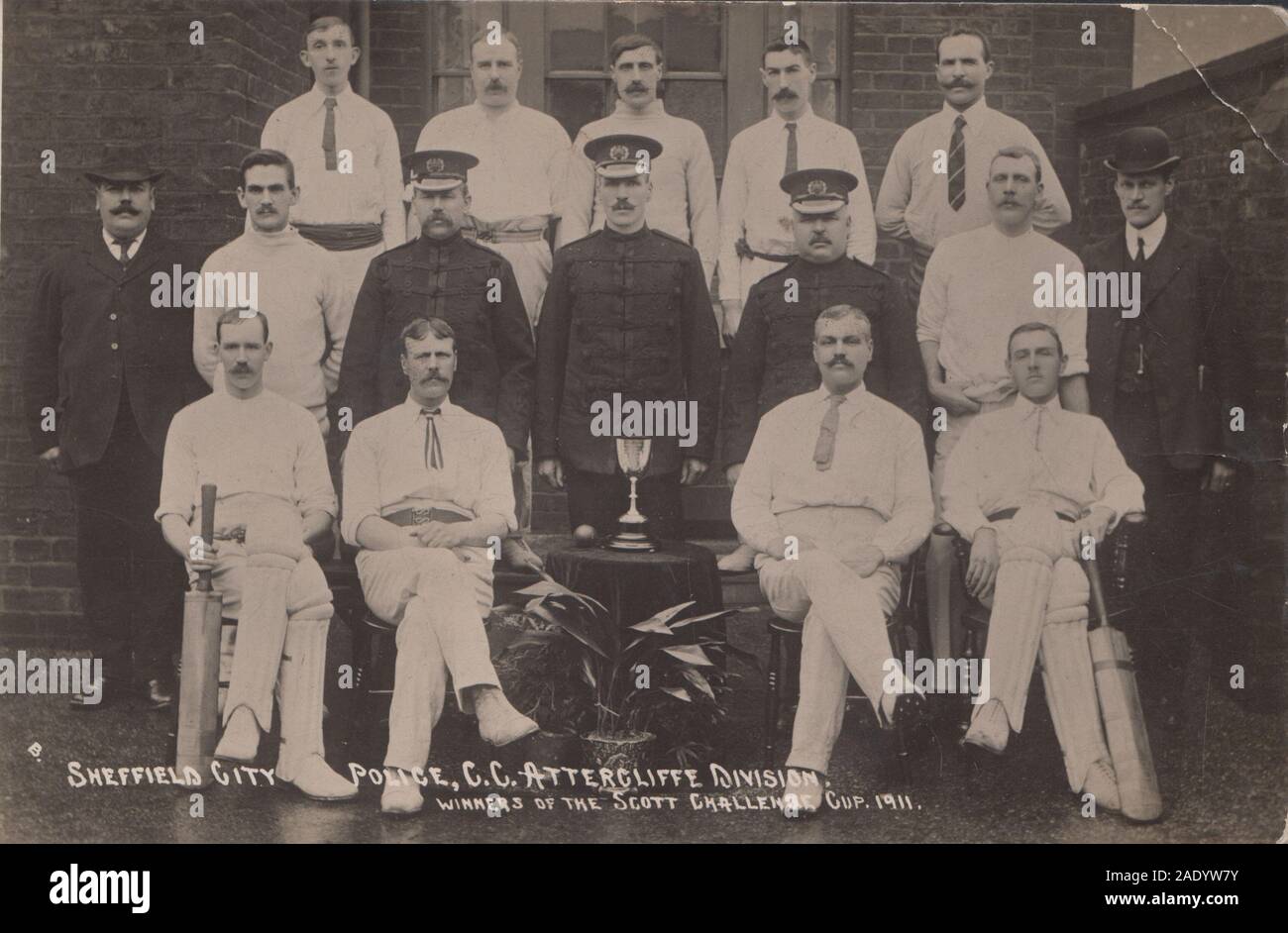 Vintage Photographic Postcard Showing The Sheffield City Police Cricket Club. Attercliffe Division. Winners of The Scott Challenge Cup in 1911. Stock Photo
