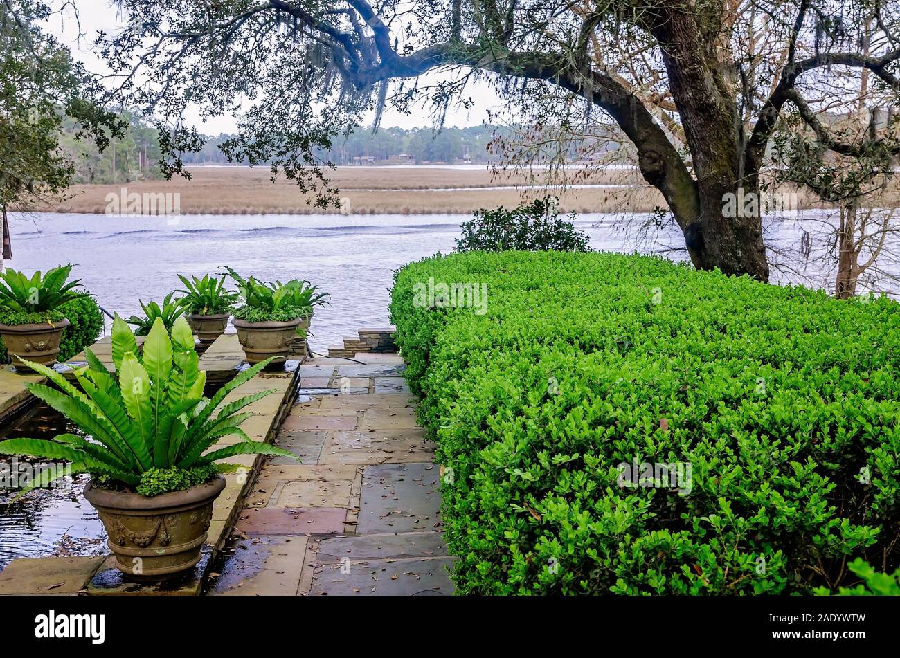 Fowl River is pictured from a cobblestone walkway at Bellingrath