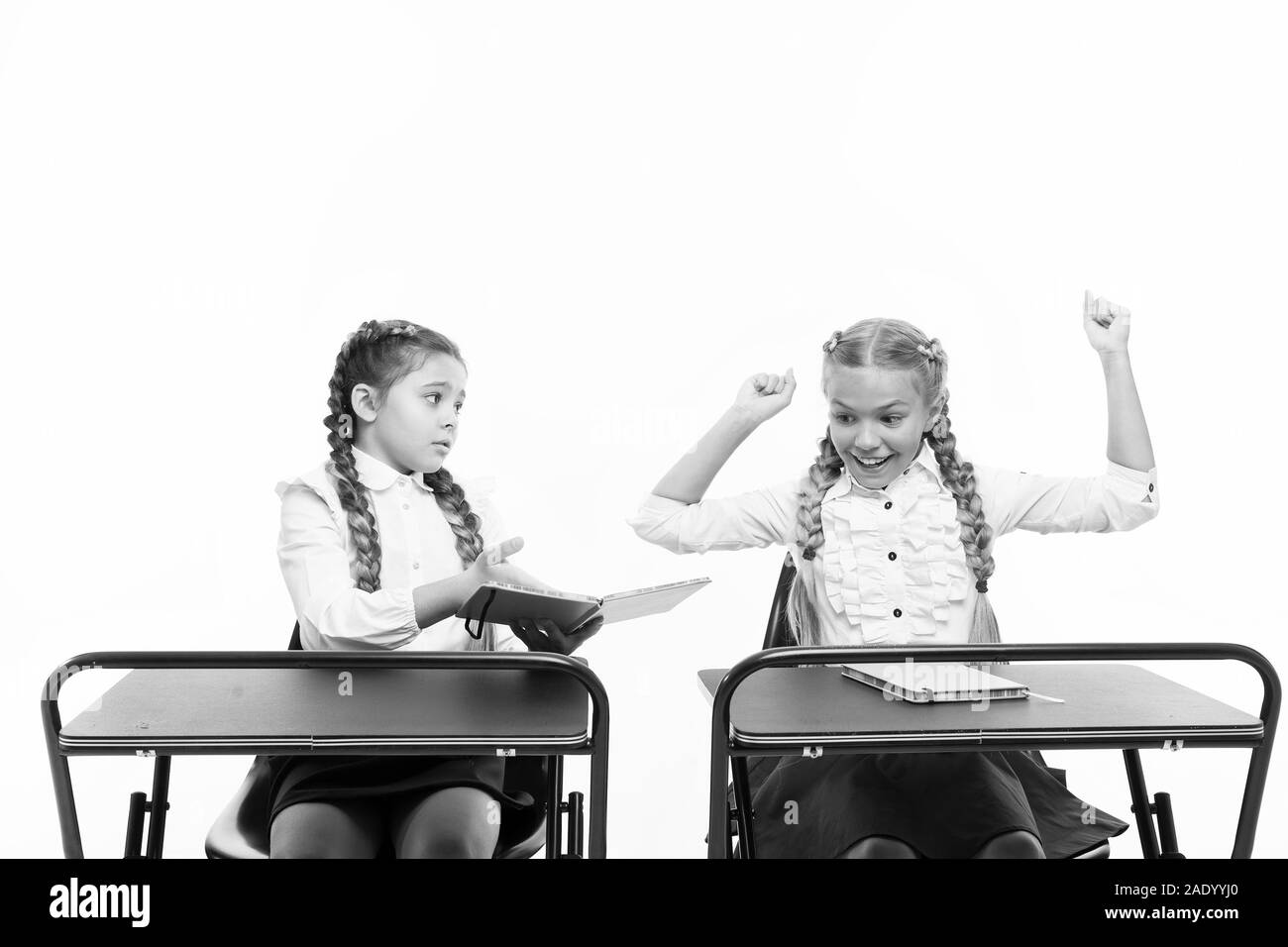 Little children learn reading and writing at school. Reading skills. Opposite impression