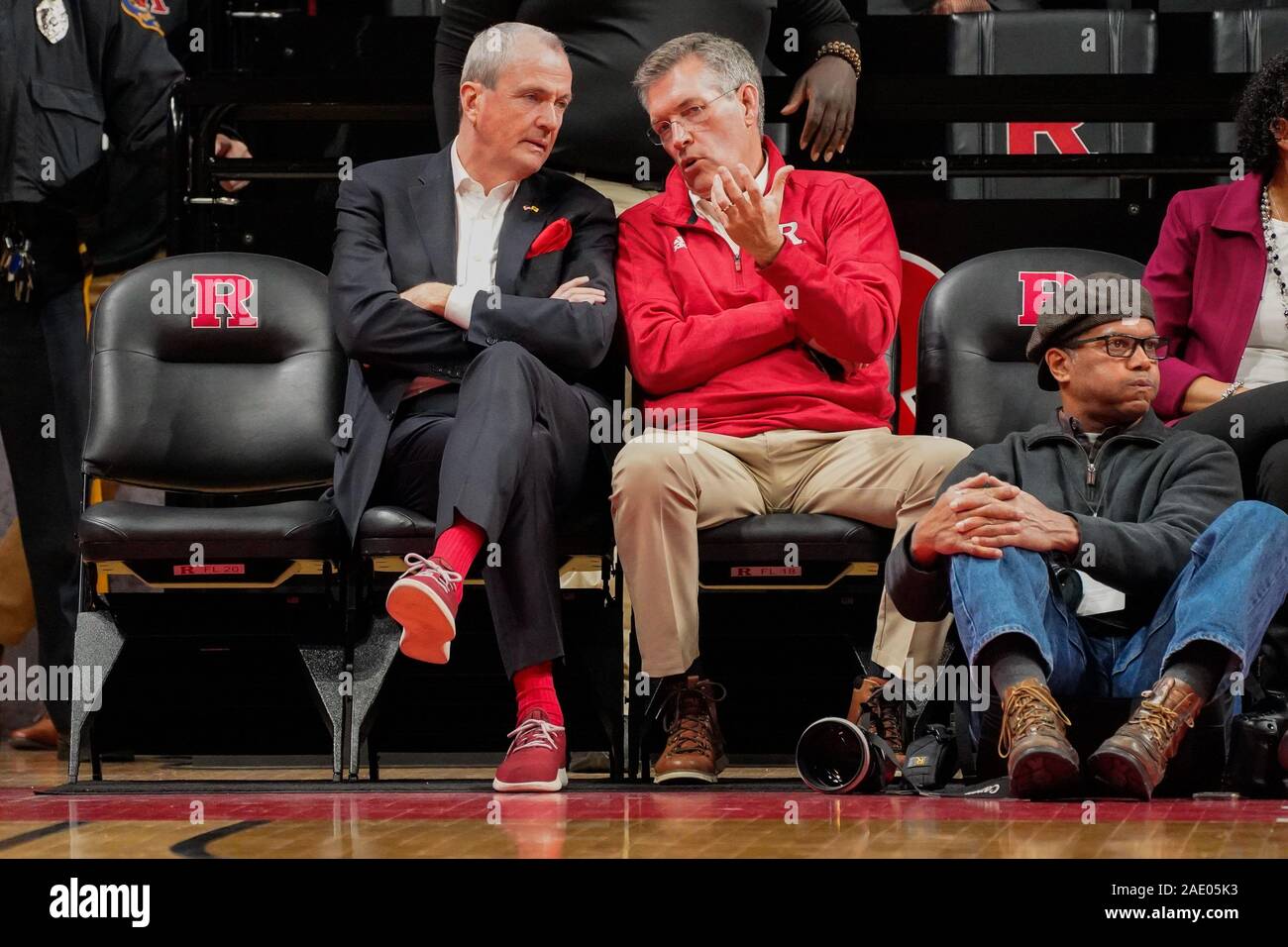 Piscataway, New Jersey, USA. 5th Dec, 2019. New Jersey Governor, PHIL MURPHY talks with Rutgers Director of Athletics, PAT HOBBS, at a Rutgers womenÃs basketball game at the Rutgers Athletic Center in Piscataway, New Jersey. Credit: Joel Plummer/ZUMA Wire/Alamy Live News Stock Photo