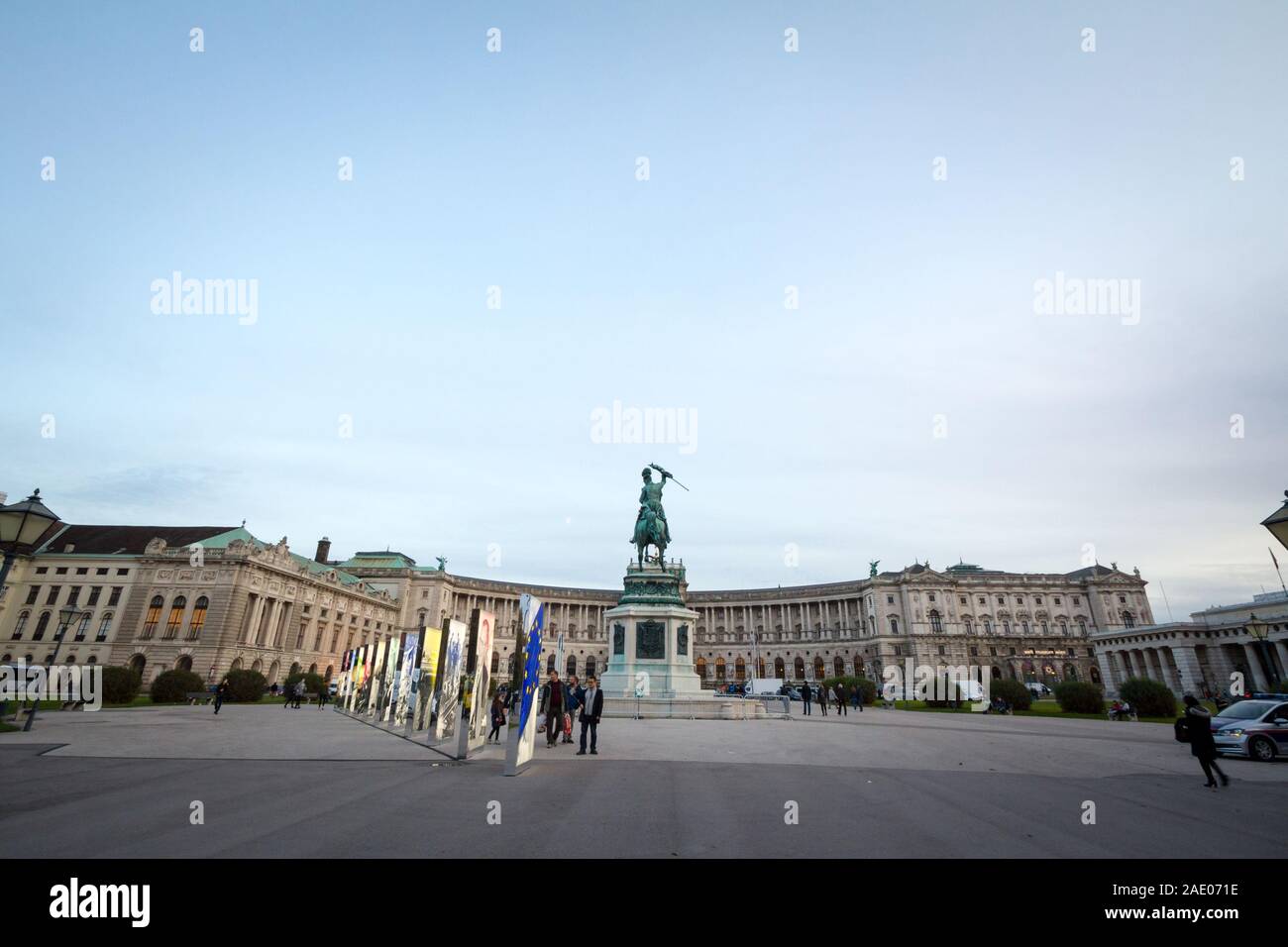 VIENNA, AUSTRIA - NOVEMBER 6, 2019: Hofburg palace, on its Neue Burg aisle, taken from the Heldenplatz square, with the 19th century Prinz Eugen statu Stock Photo