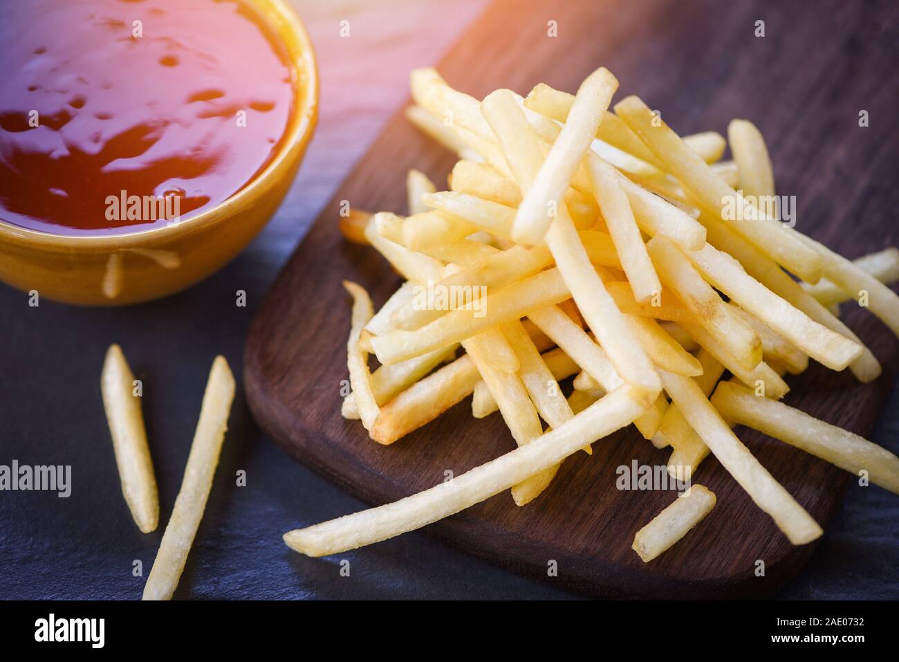french fries ketchup in wooden board with black background / Tasty potato  fries for food or snack delicious Italian meny homemade ingredients Stock  Photo - Alamy