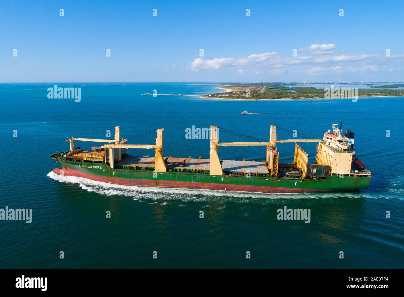 ZEA Singapore ocean going pacific ocean transport freighter outbound from Tampa Florida Stock Photo