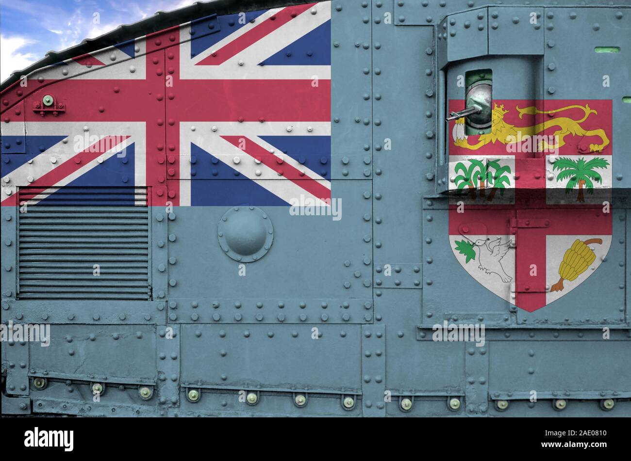 Fiji flag depicted on side part of military armored tank close up. Army forces conceptual background Stock Photo
