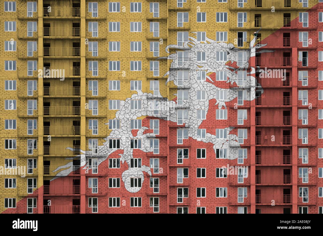 Bhutan Flag Depicted In Paint Colors On Multi Storey Residental