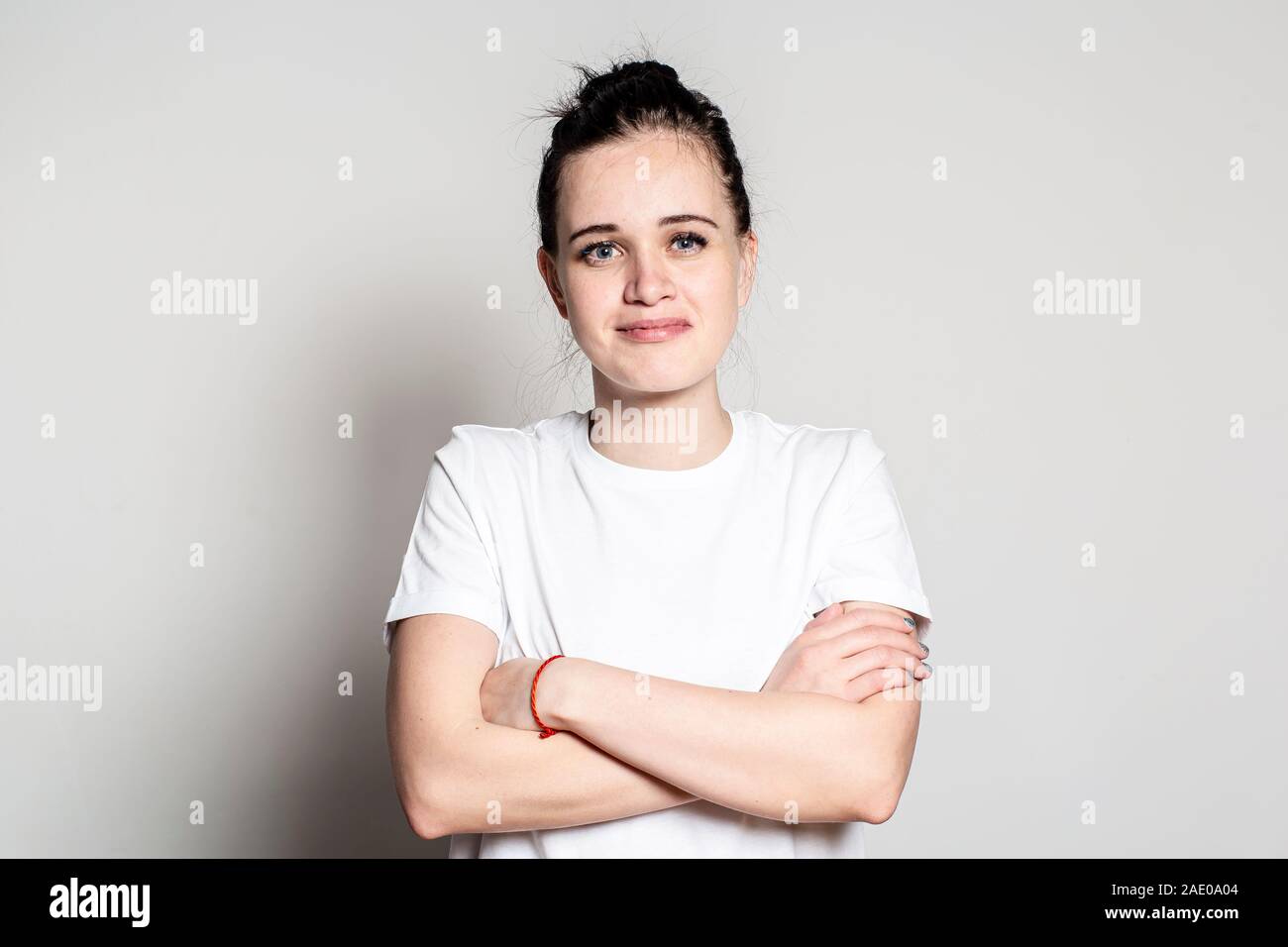 Woman joy beautiful crossed arms hi-res stock photography and images ...