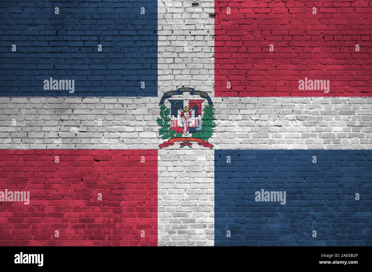 Dominican Republic flag depicted in paint colors on old brick wall ...