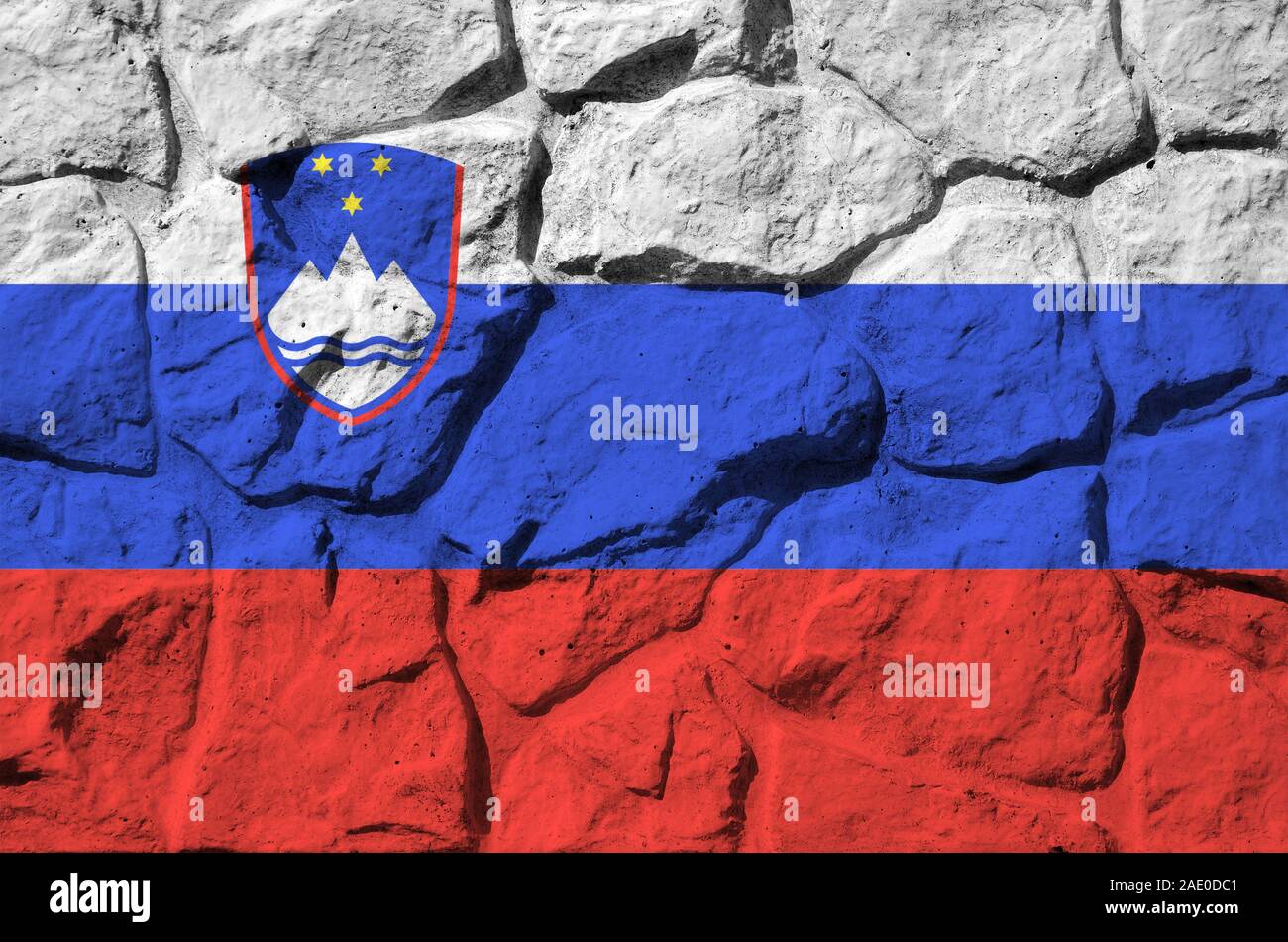 Slovenia flag depicted in paint colors on old stone wall close up ...