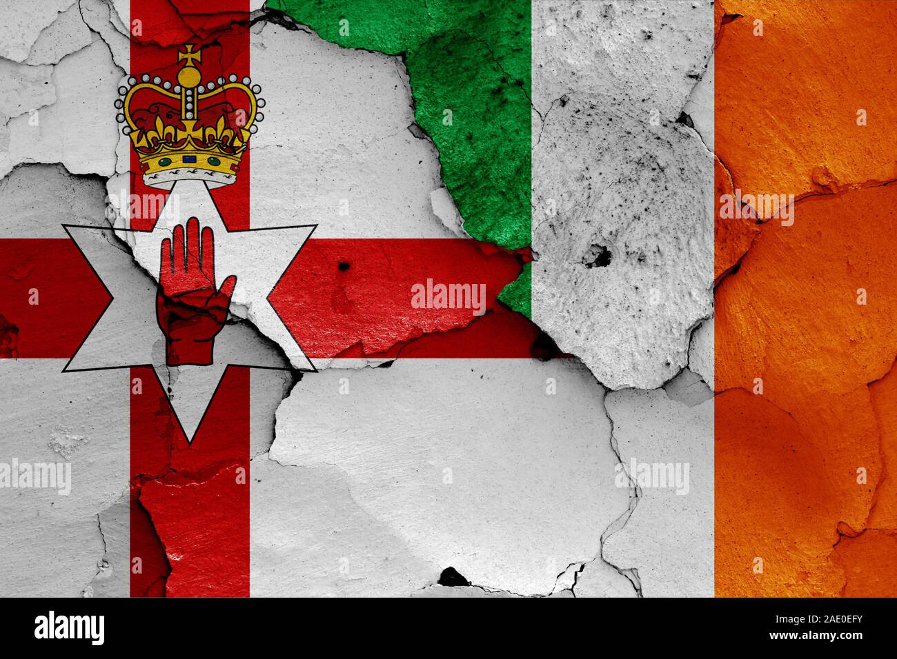 flags of Northern Ireland and Ireland painted on cracked wall Stock Photo