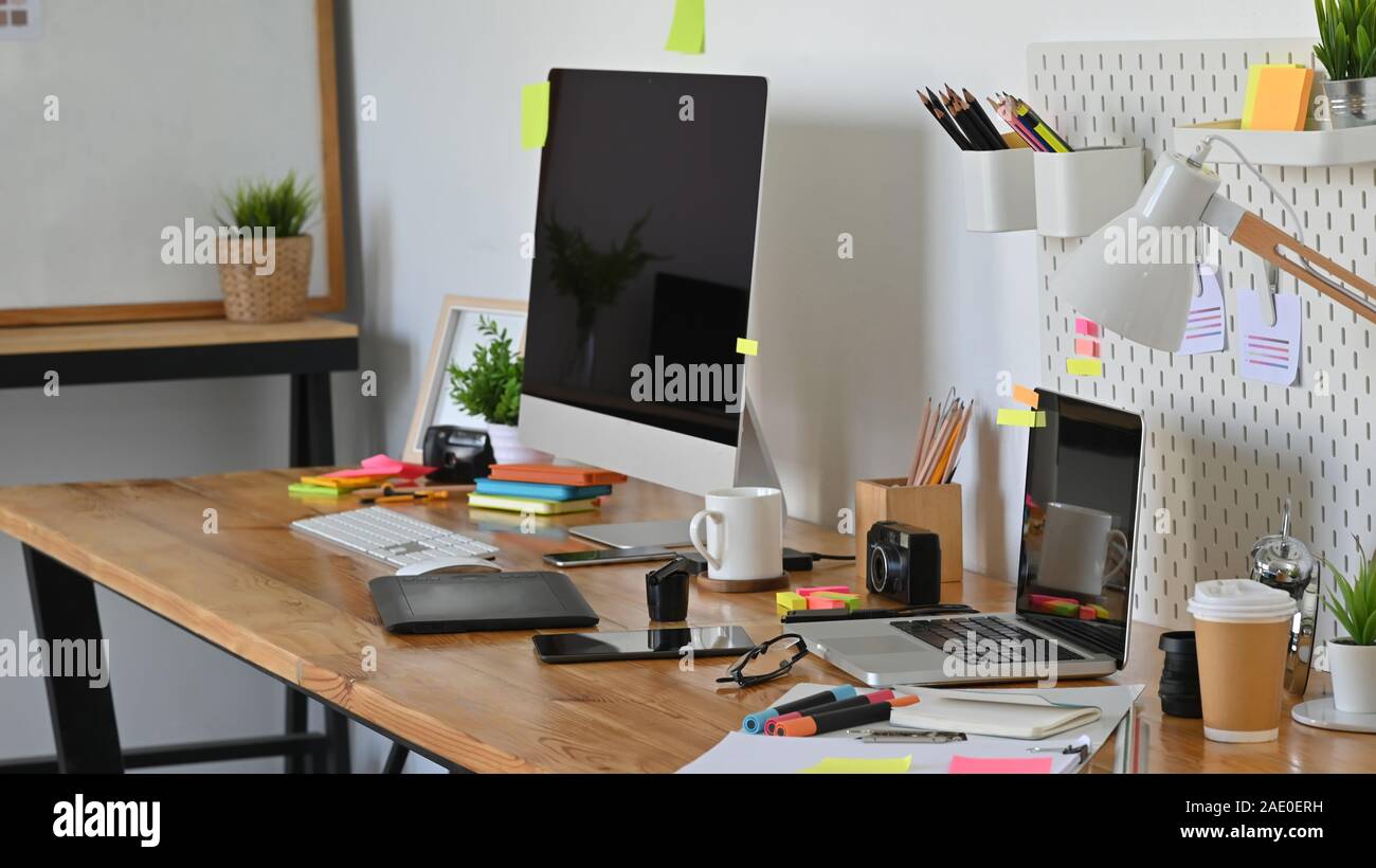 Graphic Designer Workspace With Computer And Creative Accessories