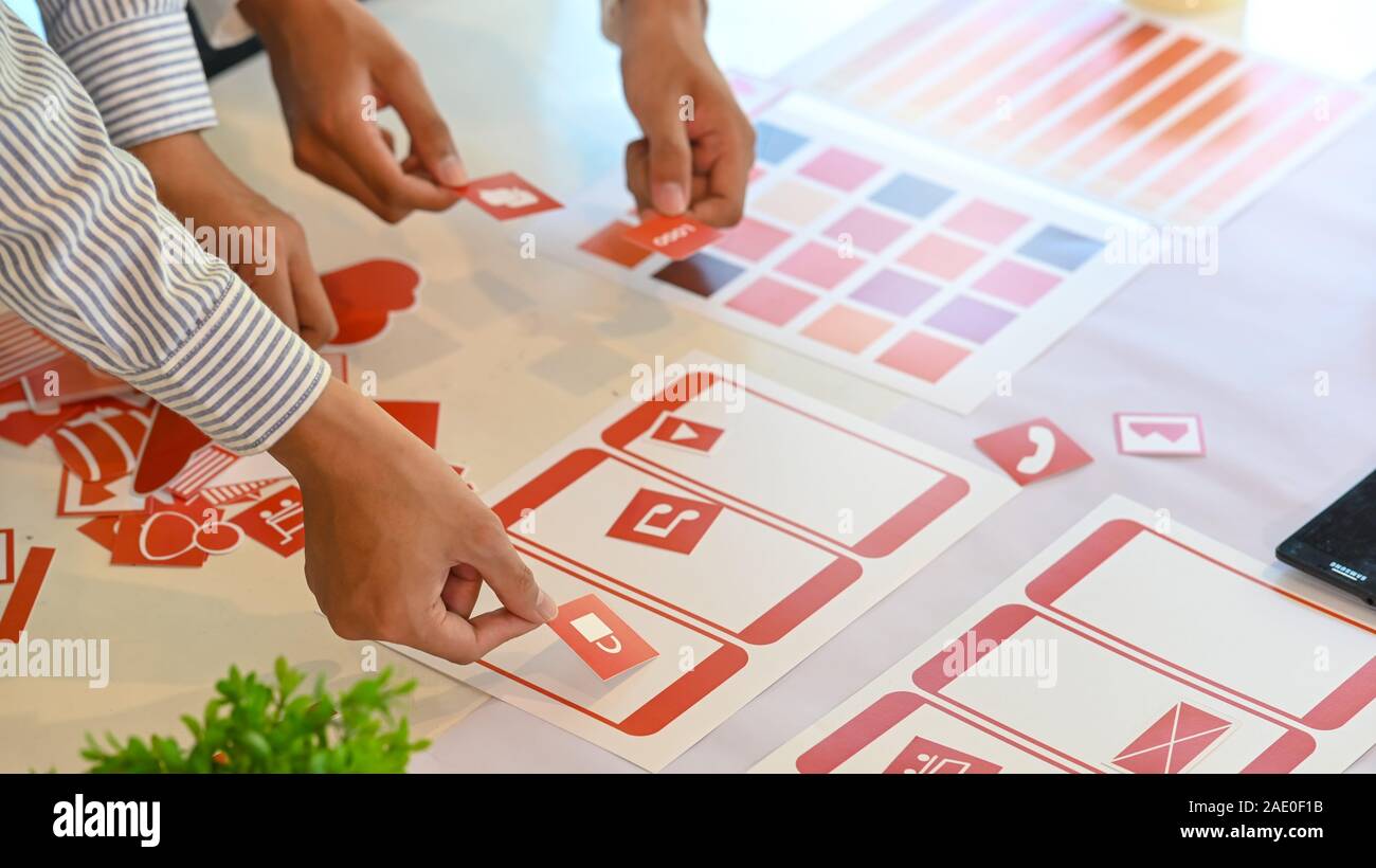 Ux Ui concept, Closeup team of development software mobile working with ...