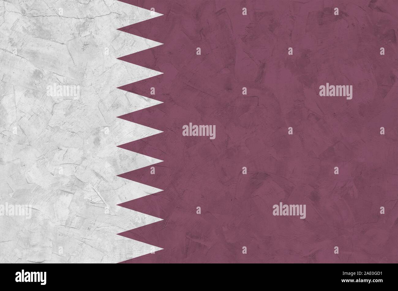Qatar flag depicted in bright paint colors on old relief plastering ...