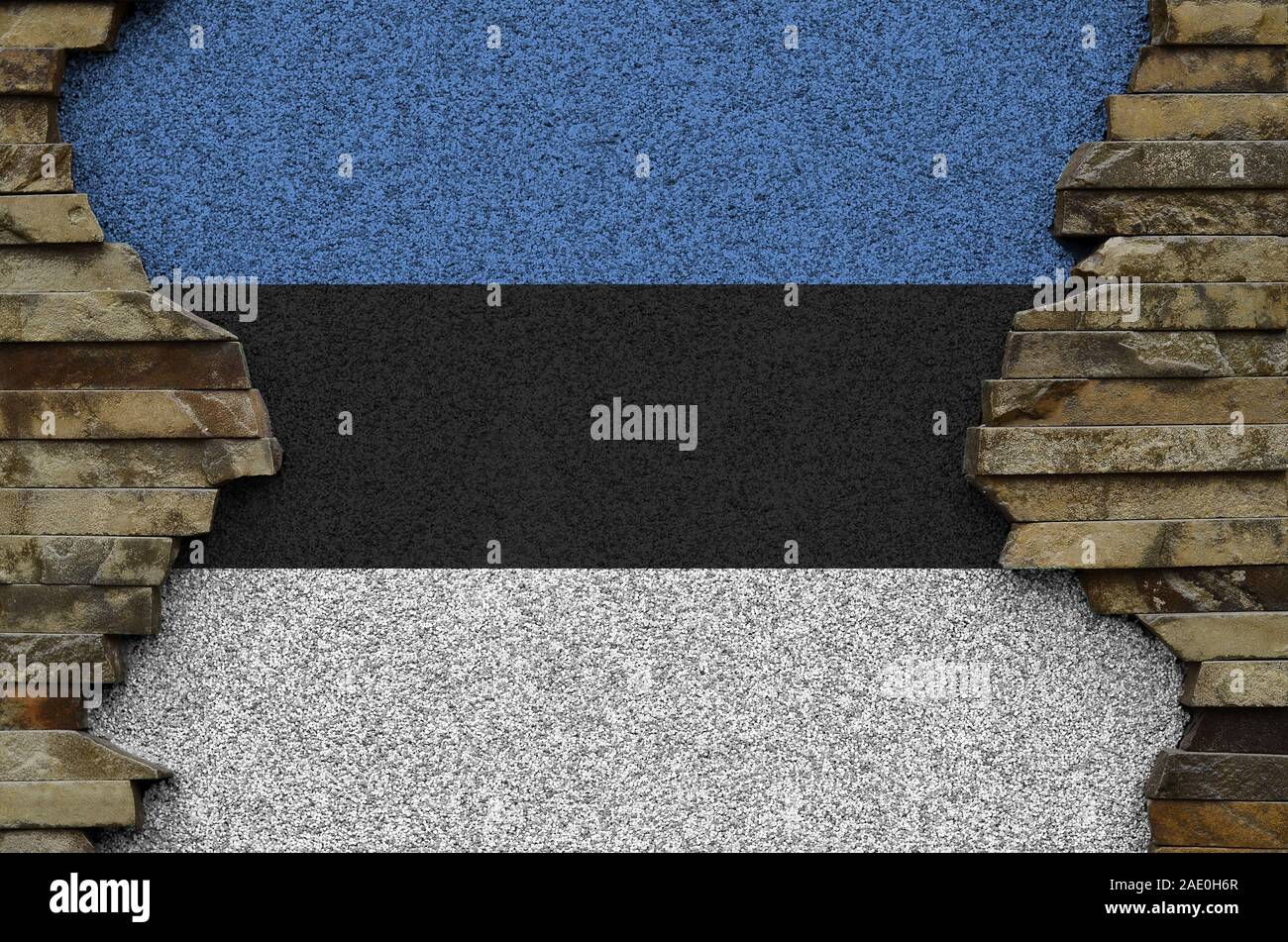 Estonia flag depicted in paint colors on old stone wall close up ...