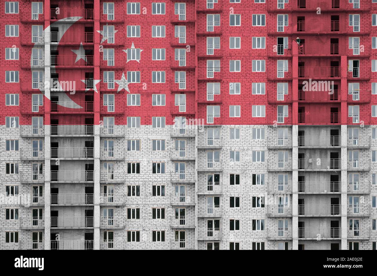 Singapore Flag Depicted In Paint Colors On Multi Storey Residental