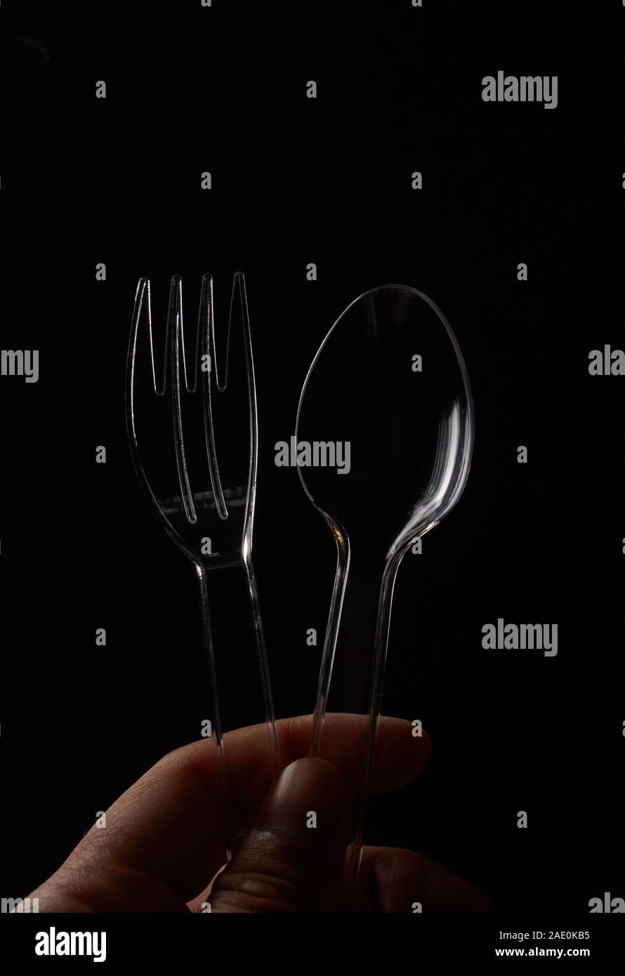The plastic spoons and forks with black background Stock Photo Alamy
