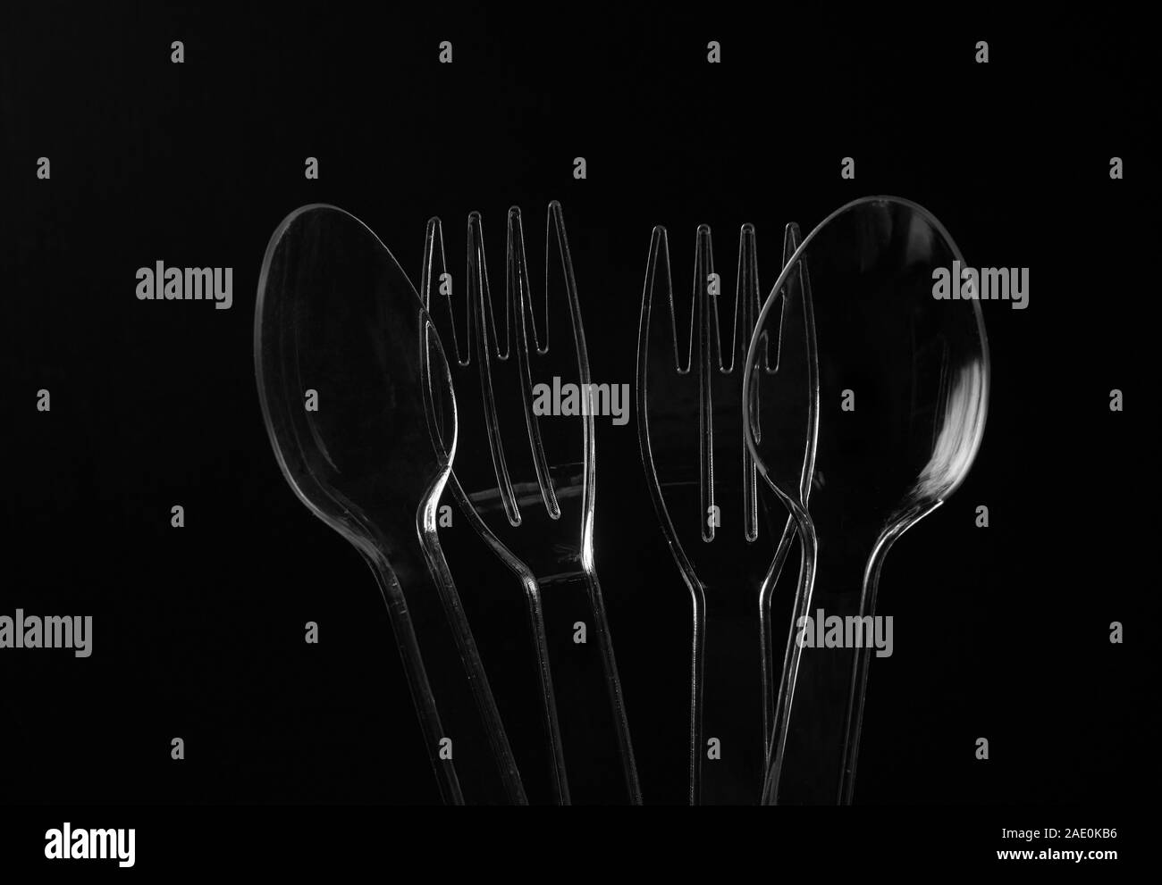 The plastic spoons and forks with black background Stock Photo Alamy