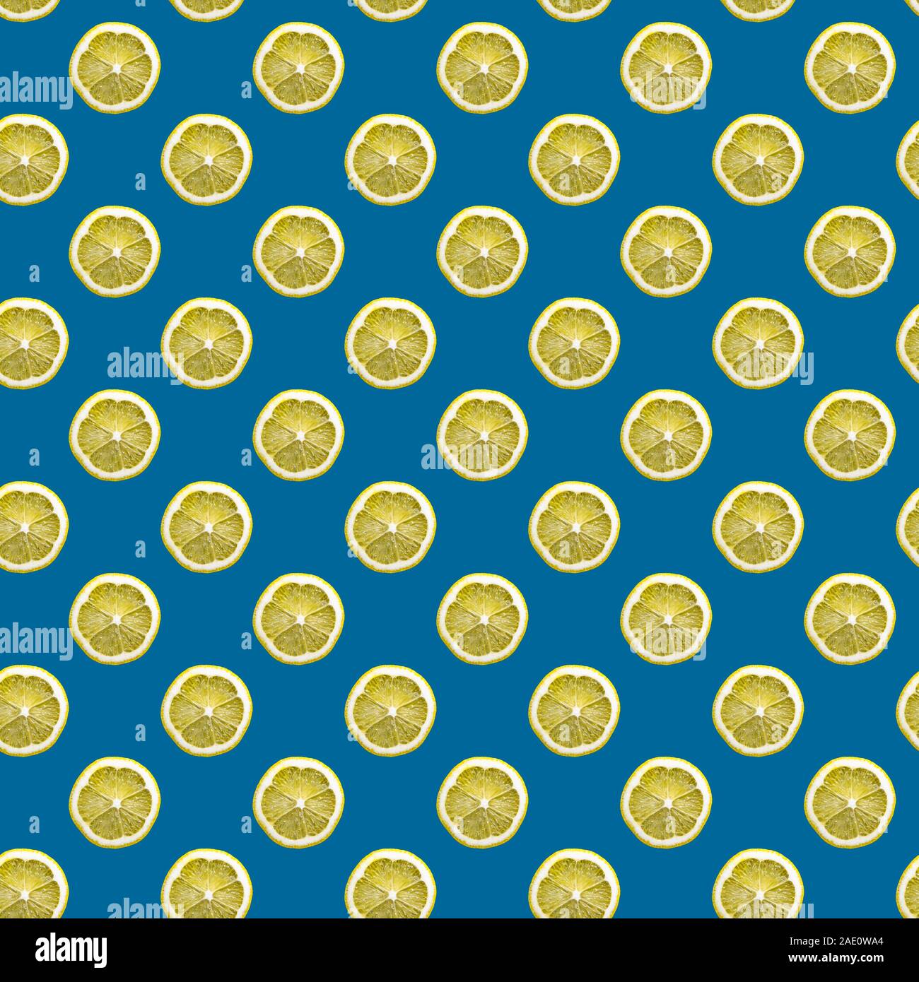 yellow lemon pattern on a classic blue background Stock Photo