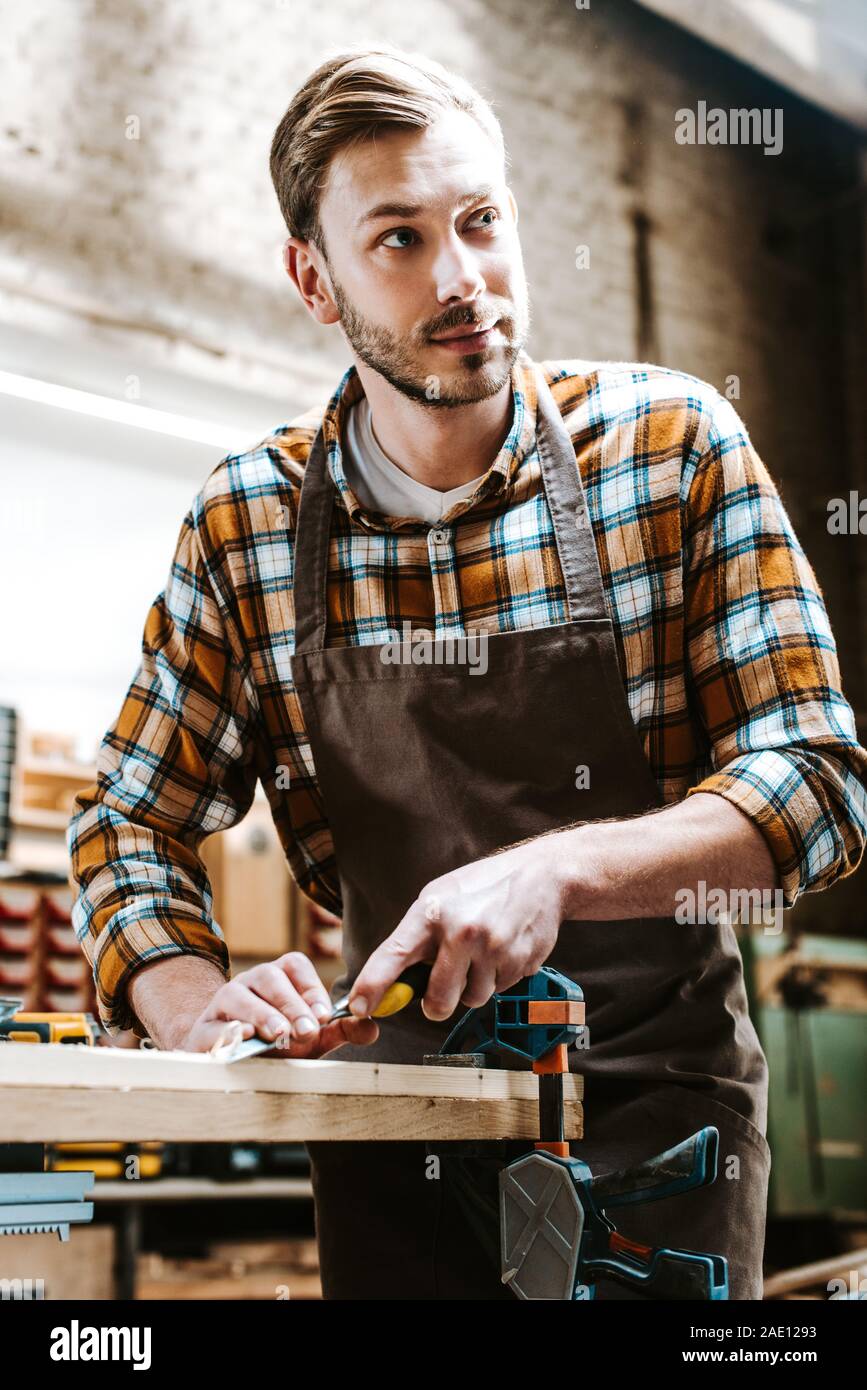 Man Holding Chisel High Resolution Stock Photography and Images - Alamy