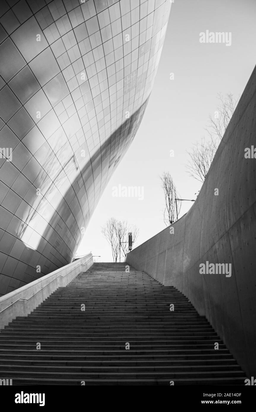 DEC 11, 2015 Seoul, South Korea - Dongdaemun design plaza or DDP modern free from building architecture in black and white with metalic facade and lon Stock Photo