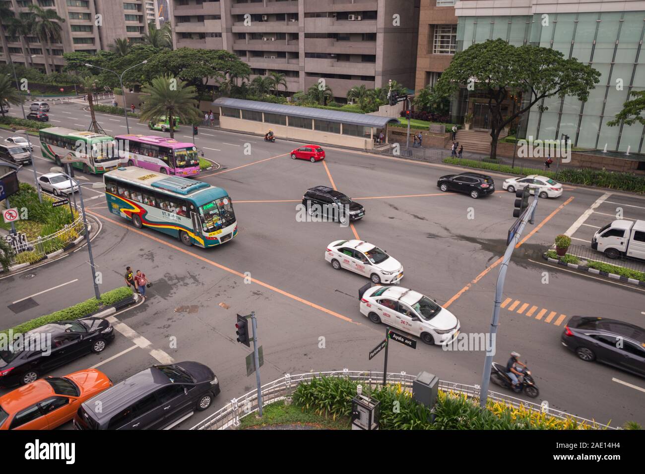 Manila, Philippines - August 22, 2017: Traffic and cars at intersection in Makati in rush hour Stock Photo