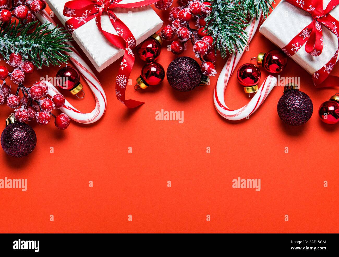 Christmas and New year background with fir branches, holly berry, pine ...