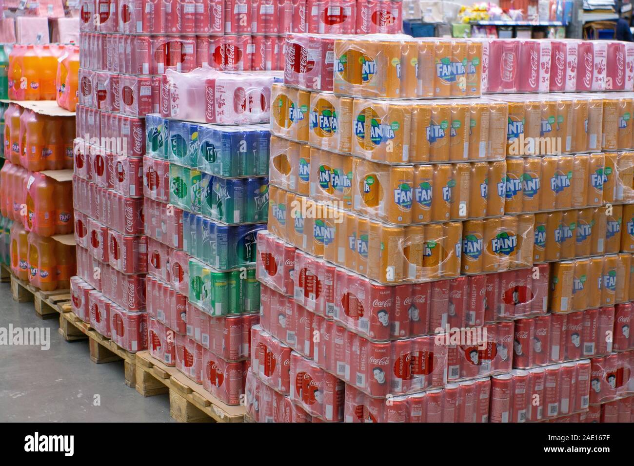 Tyumen, Russia - November 20, 2019: carbonated drink, Coca Cola, sprite, Fanta, in cans Sale of drinks in the hypermarket metro Stock Photo