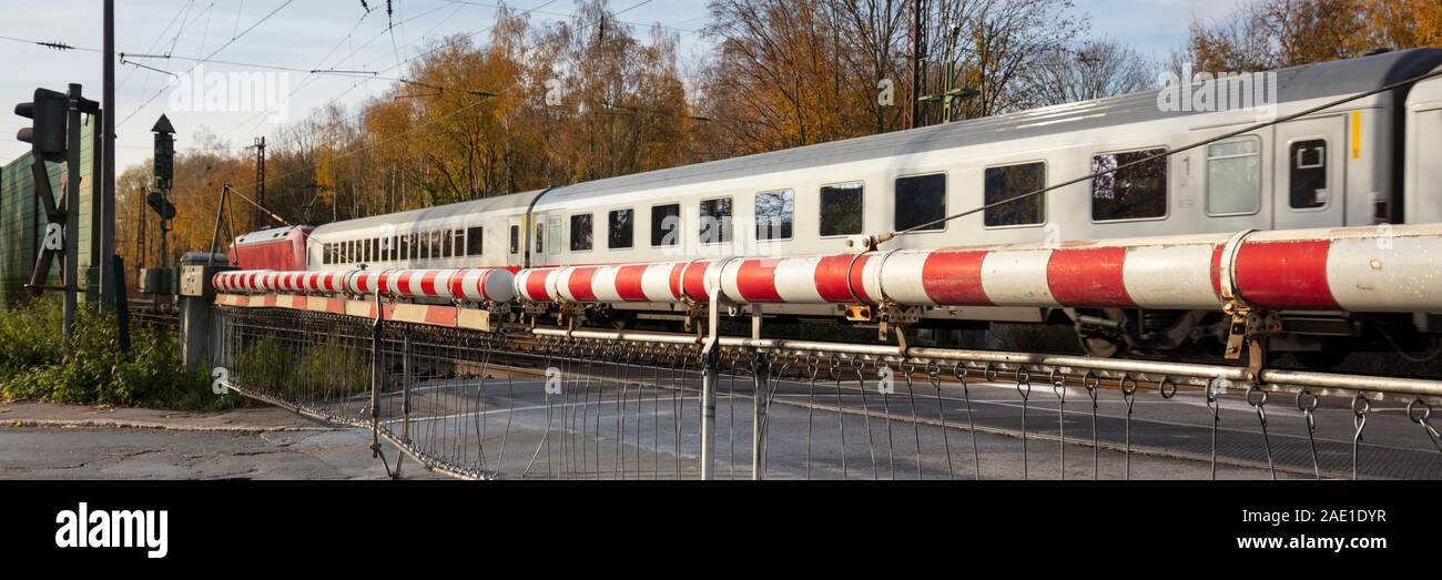 Closed gate with driving train, Dortmund, North Rhine-Westphalia, Germany, Europe Stock Photo