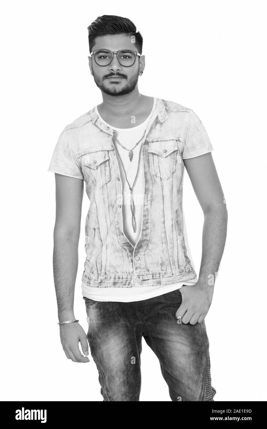 Handsome indian man in black Black and White Stock Photos & Images - Alamy