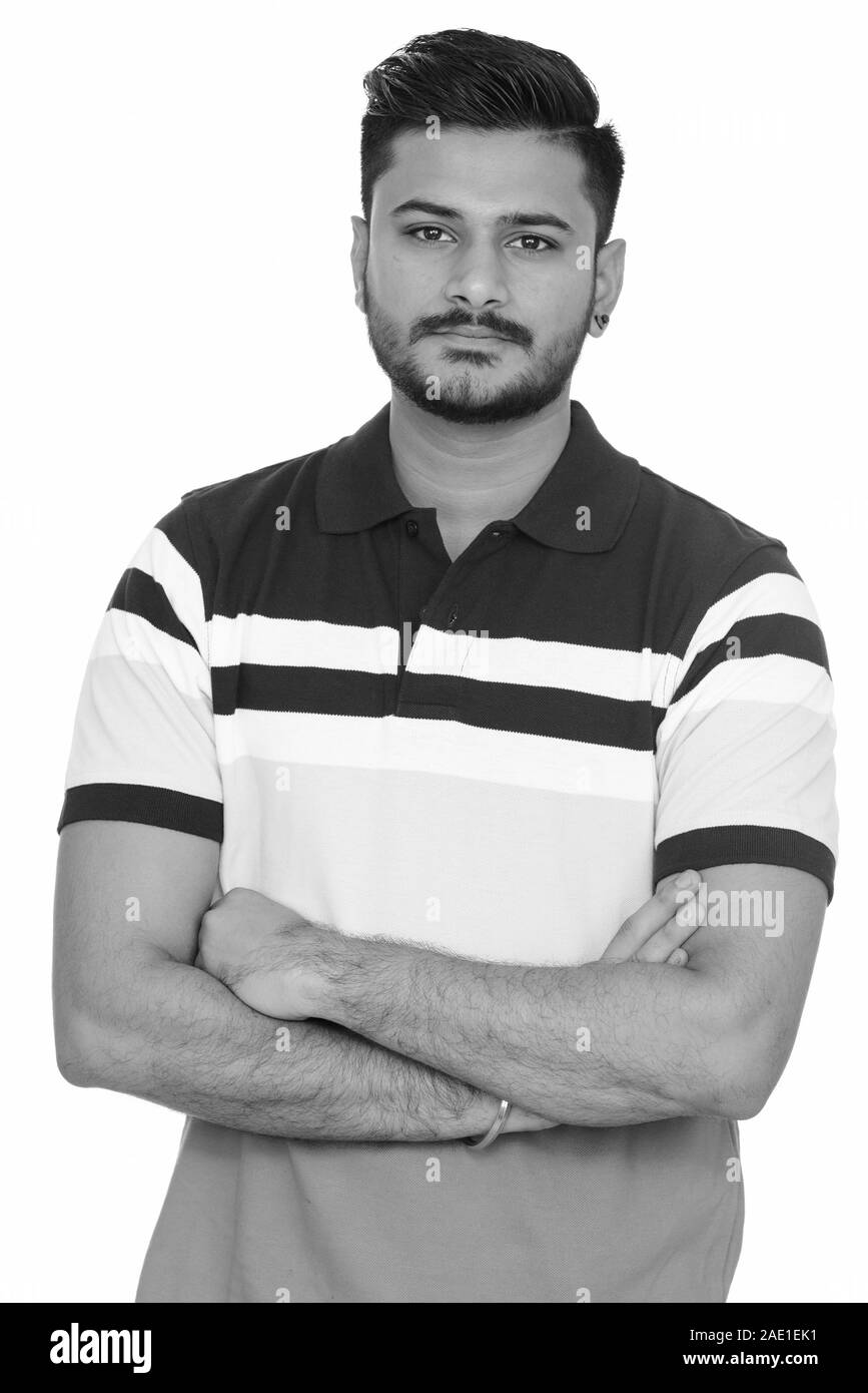 Young handsome Indian man with arms crossed Stock Photo - Alamy