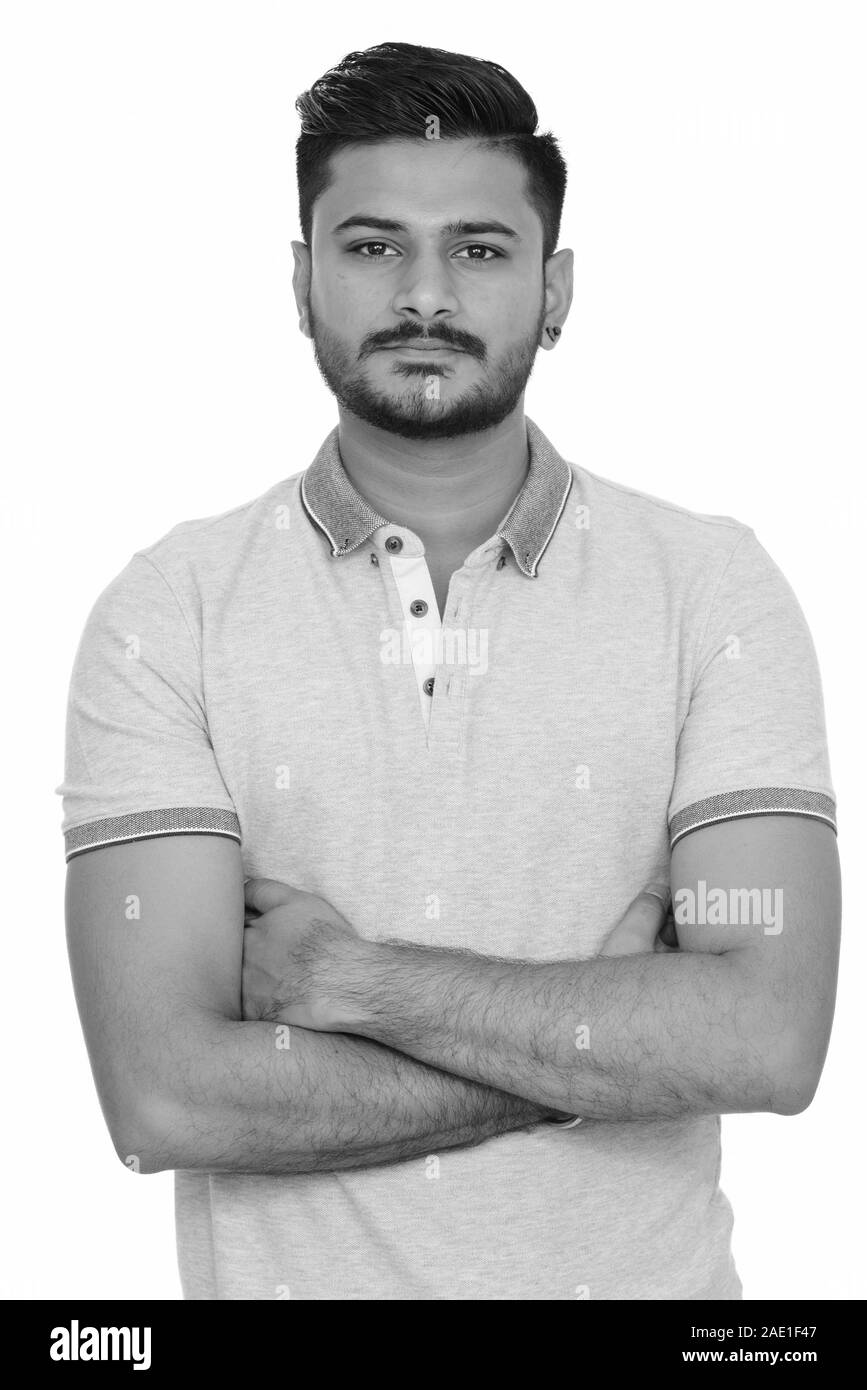 Young handsome Indian man with arms crossed Stock Photo - Alamy