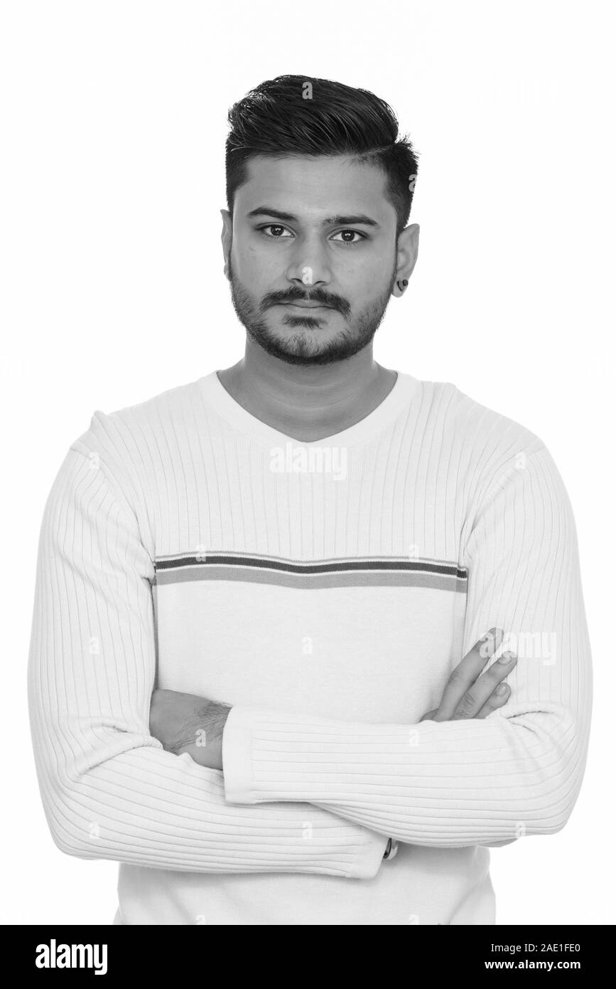 Young handsome Indian man with arms crossed Stock Photo - Alamy
