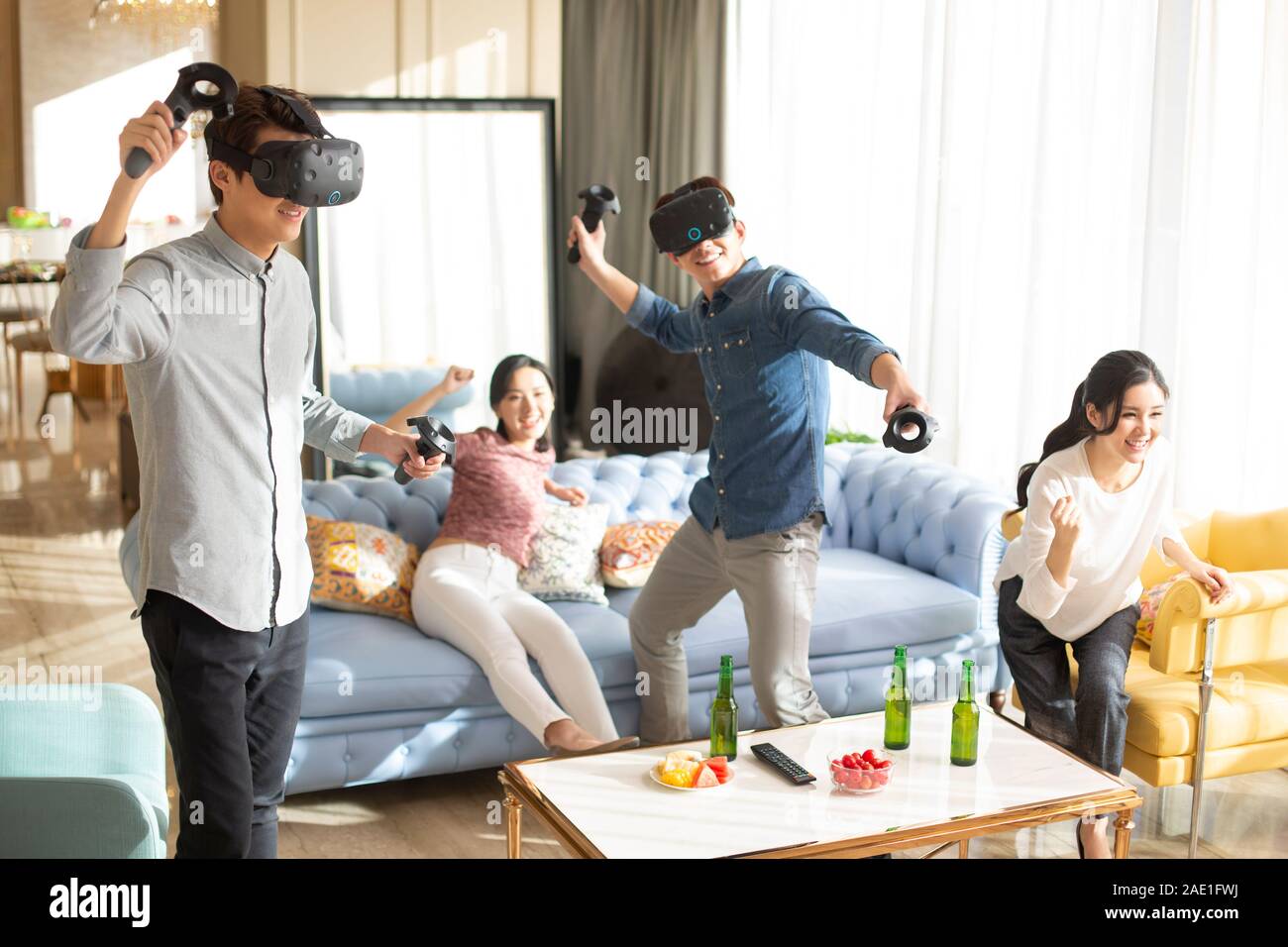 Young friends playing VR game Stock Photo Alamy