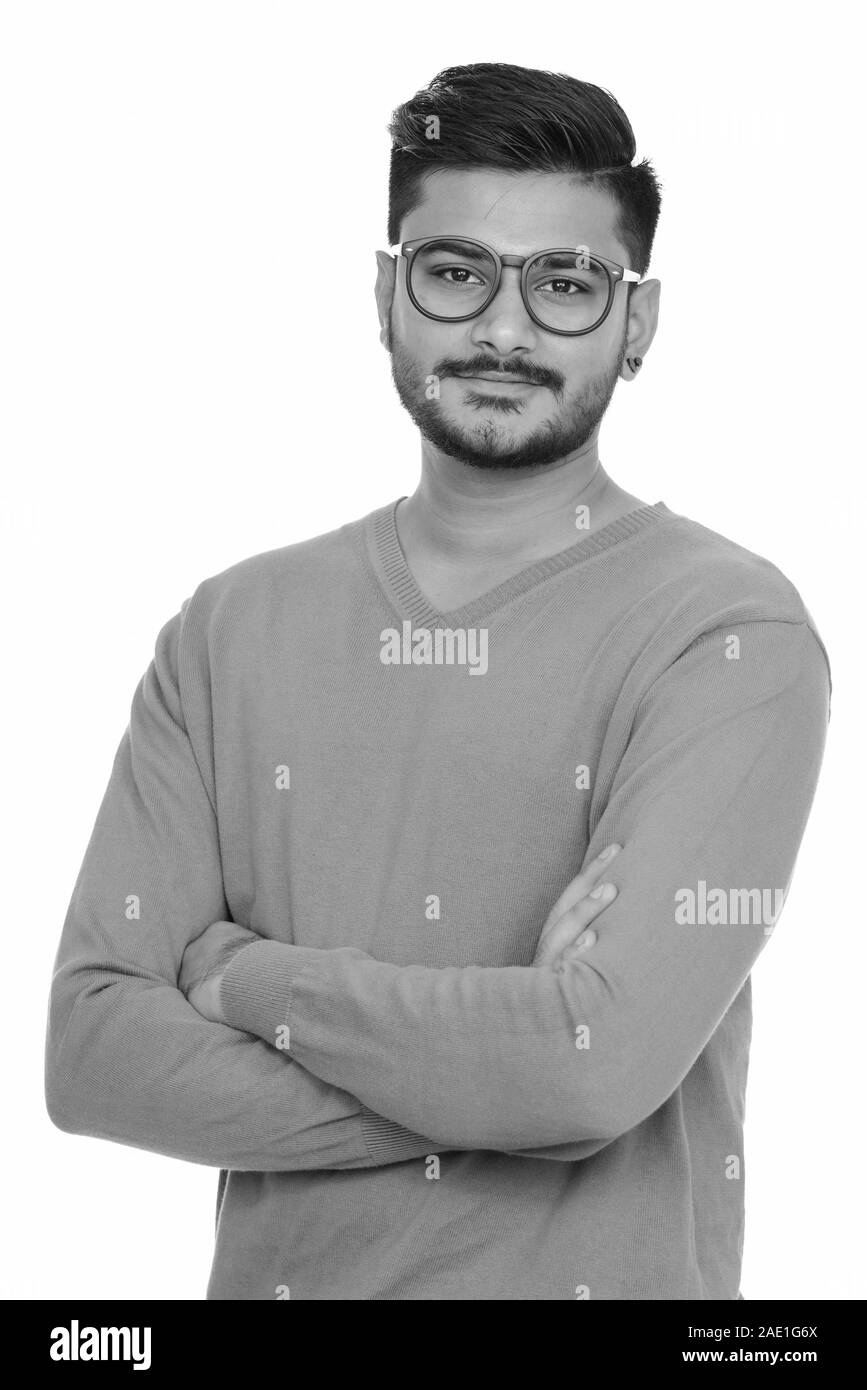 Young handsome Indian man with arms crossed Stock Photo - Alamy