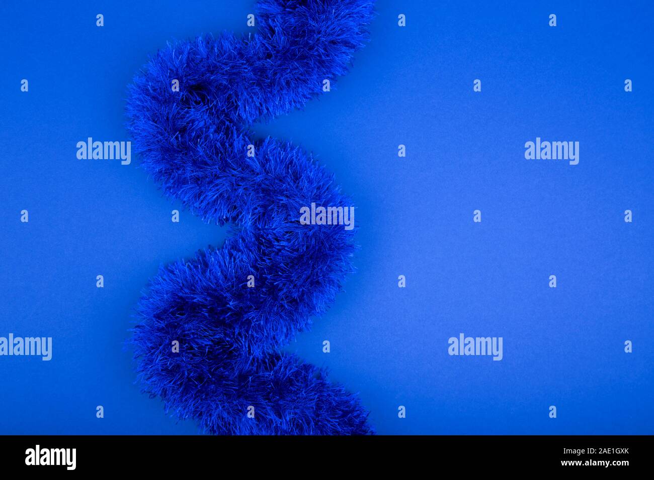 Blue artificial fur on blue background for texture or background. 2020