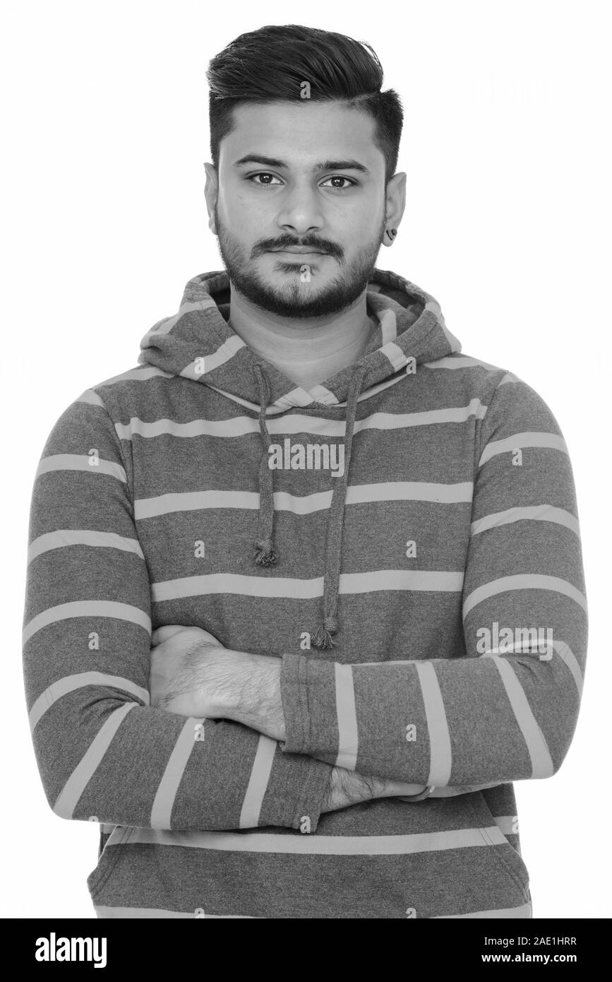 Young handsome Indian man with arms crossed Stock Photo - Alamy