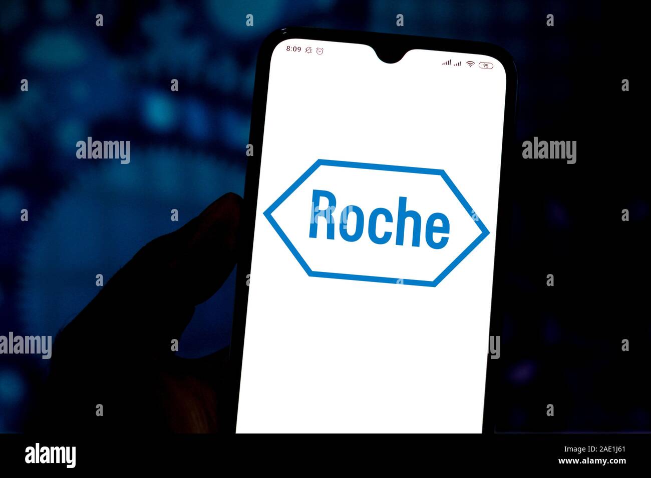 In this photo illustration the F. Hoffmann-La Roche AG logo is seen displayed on a smartphone. Stock Photo