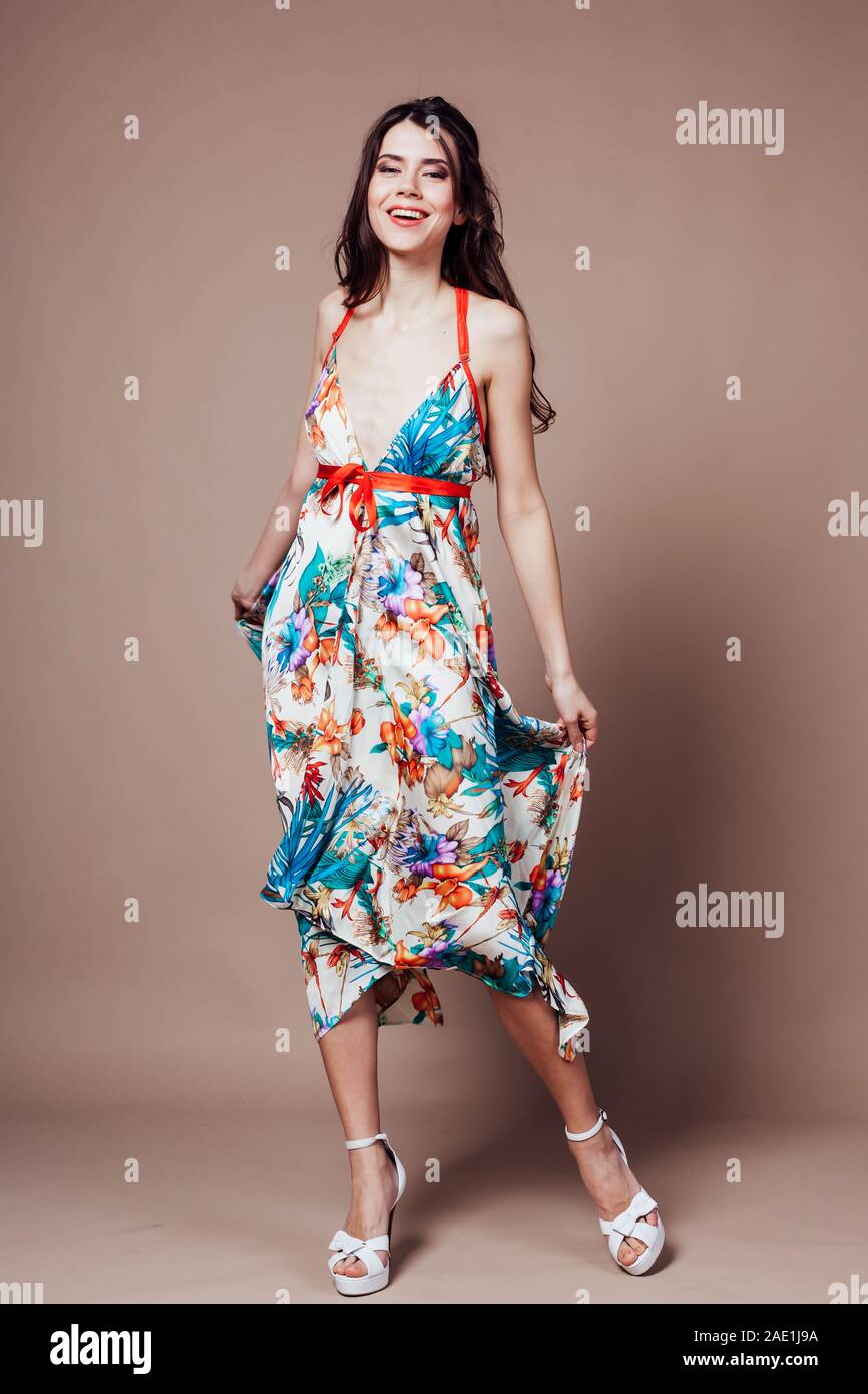 Beautiful Girl In Colored Dress Posing Smile Stock Photo Alamy Beautiful Girl In Colored Dress Posing Smile Stock Photo Alamy