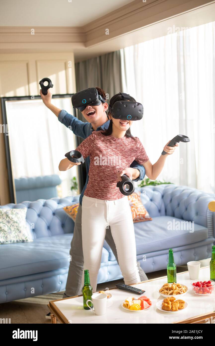 Young couple playing VR game Stock Photo