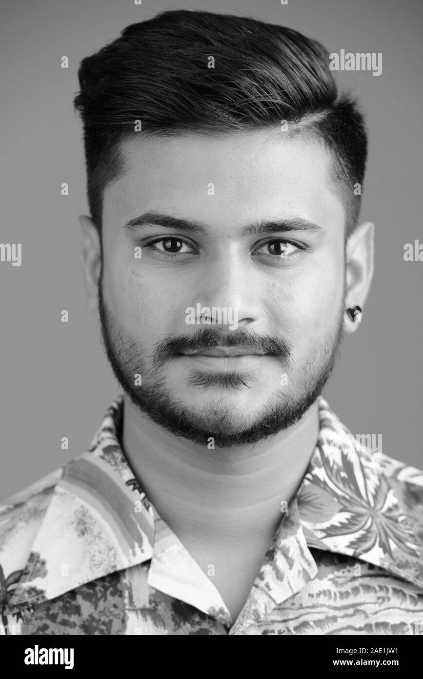 Face Of Young Handsome Indian Tourist Man Ready For Vacation Stock