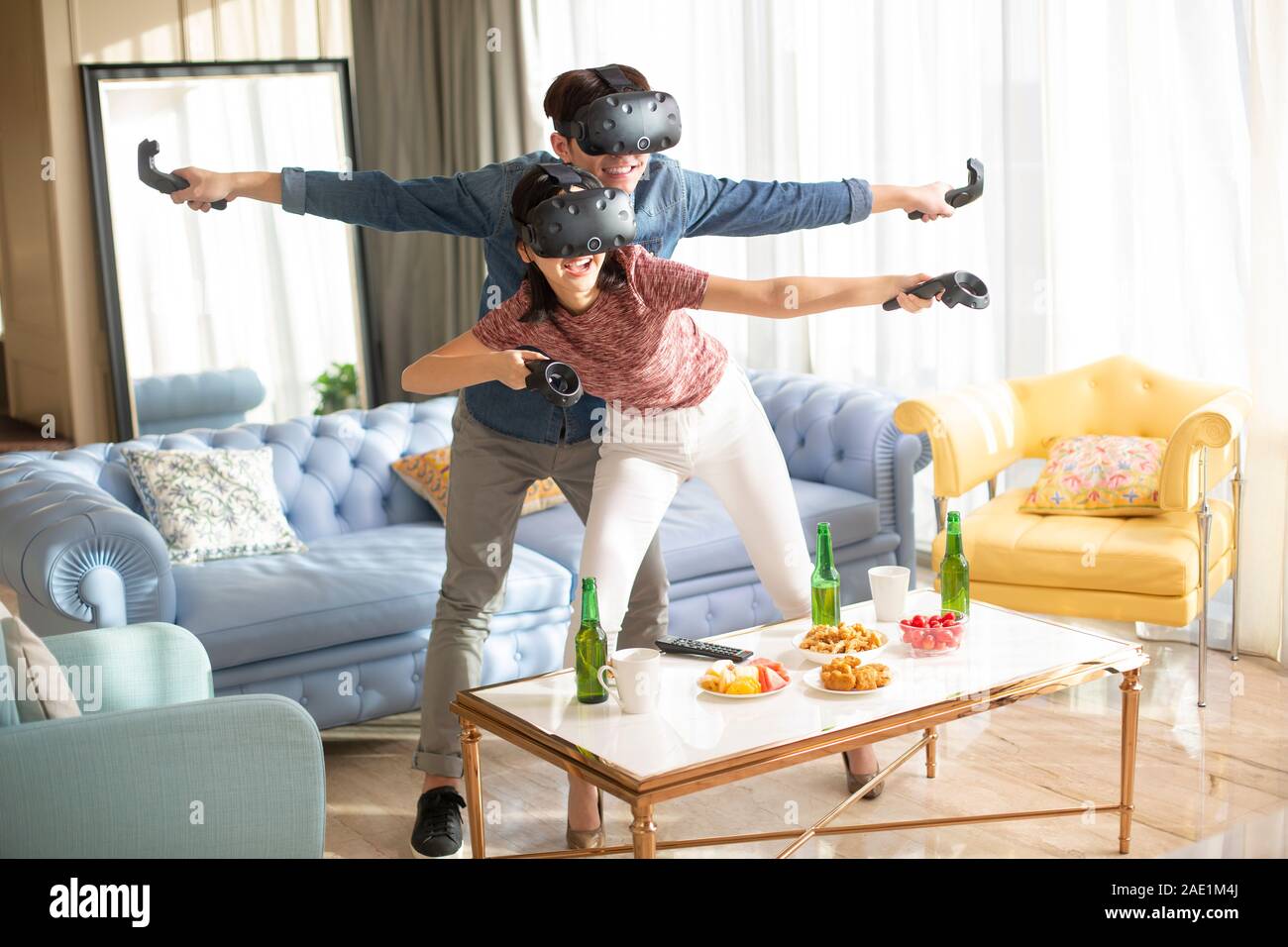 Young couple playing VR game Stock Photo