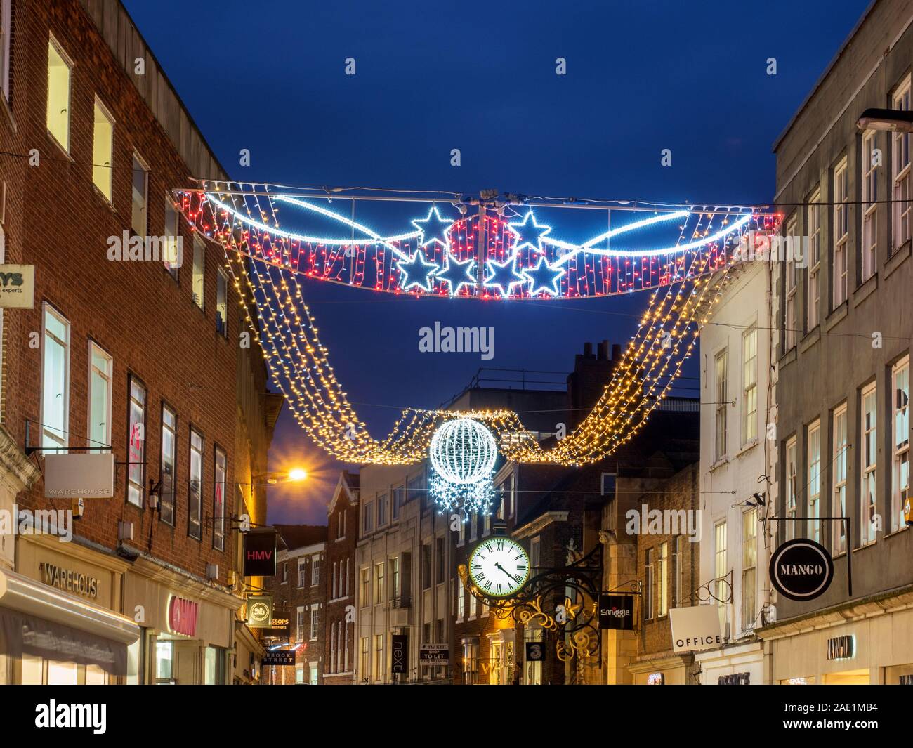 Christmas lights and the clock at St Martin le Grand Coney Street at
