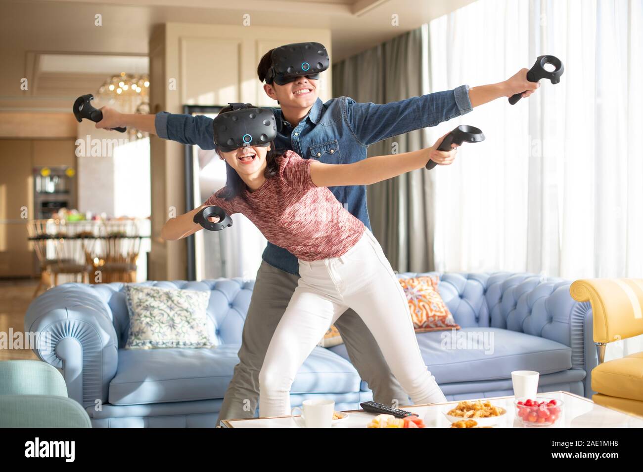 Young couple playing VR game Stock Photo