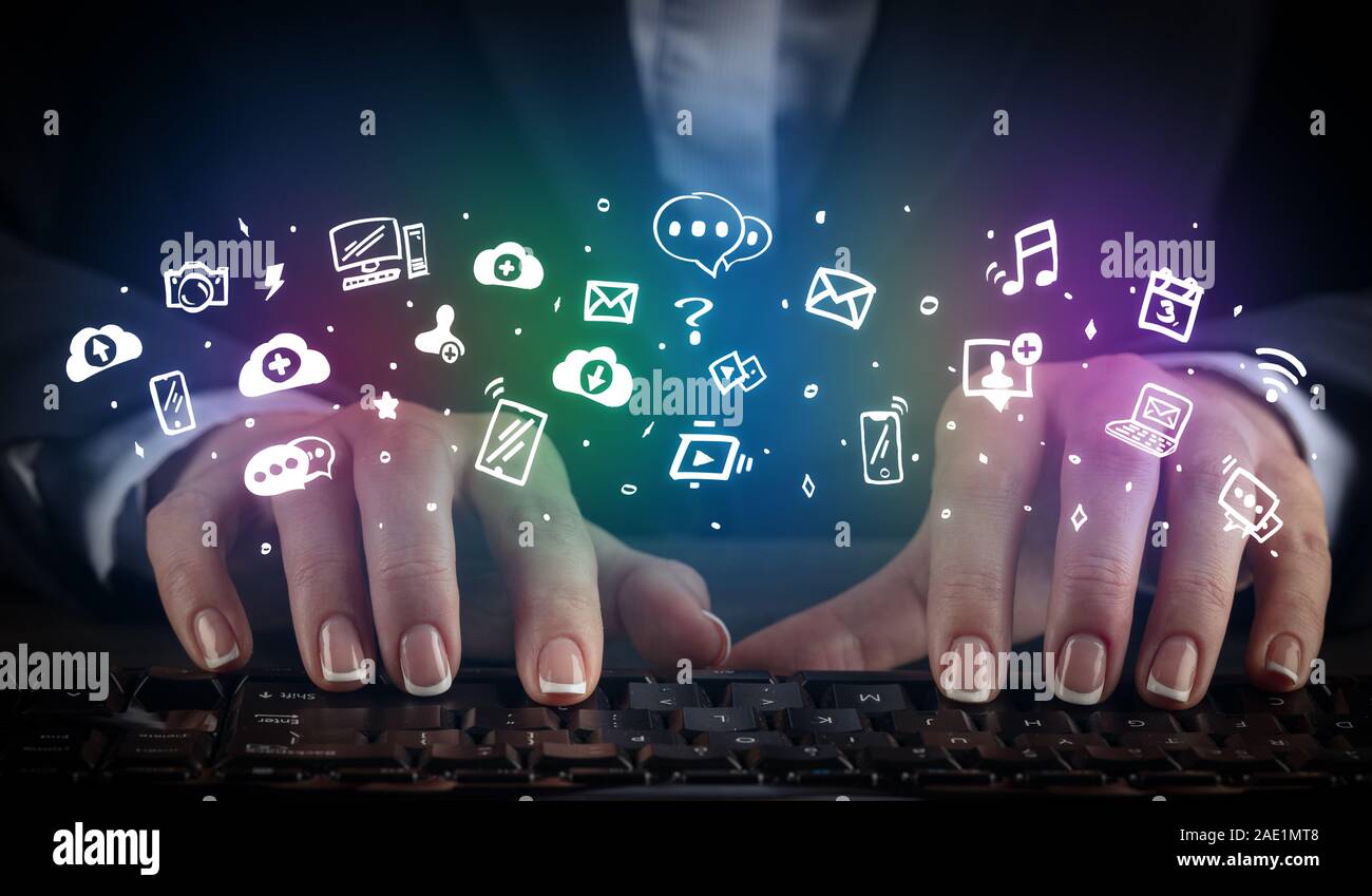 Blogger woman typing on keyboard with drawn application icons around ...