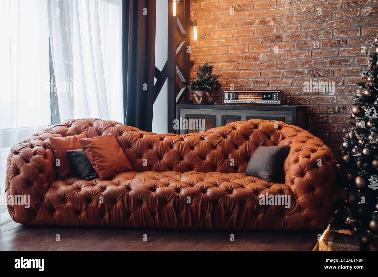 Modern Fashionable Red Leather Couch With Cushions Cropped