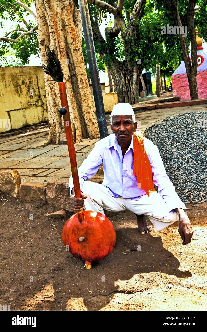 Street musician with ektara, Athani, Belgaum, Karnataka, India, Asia Stock Photo
