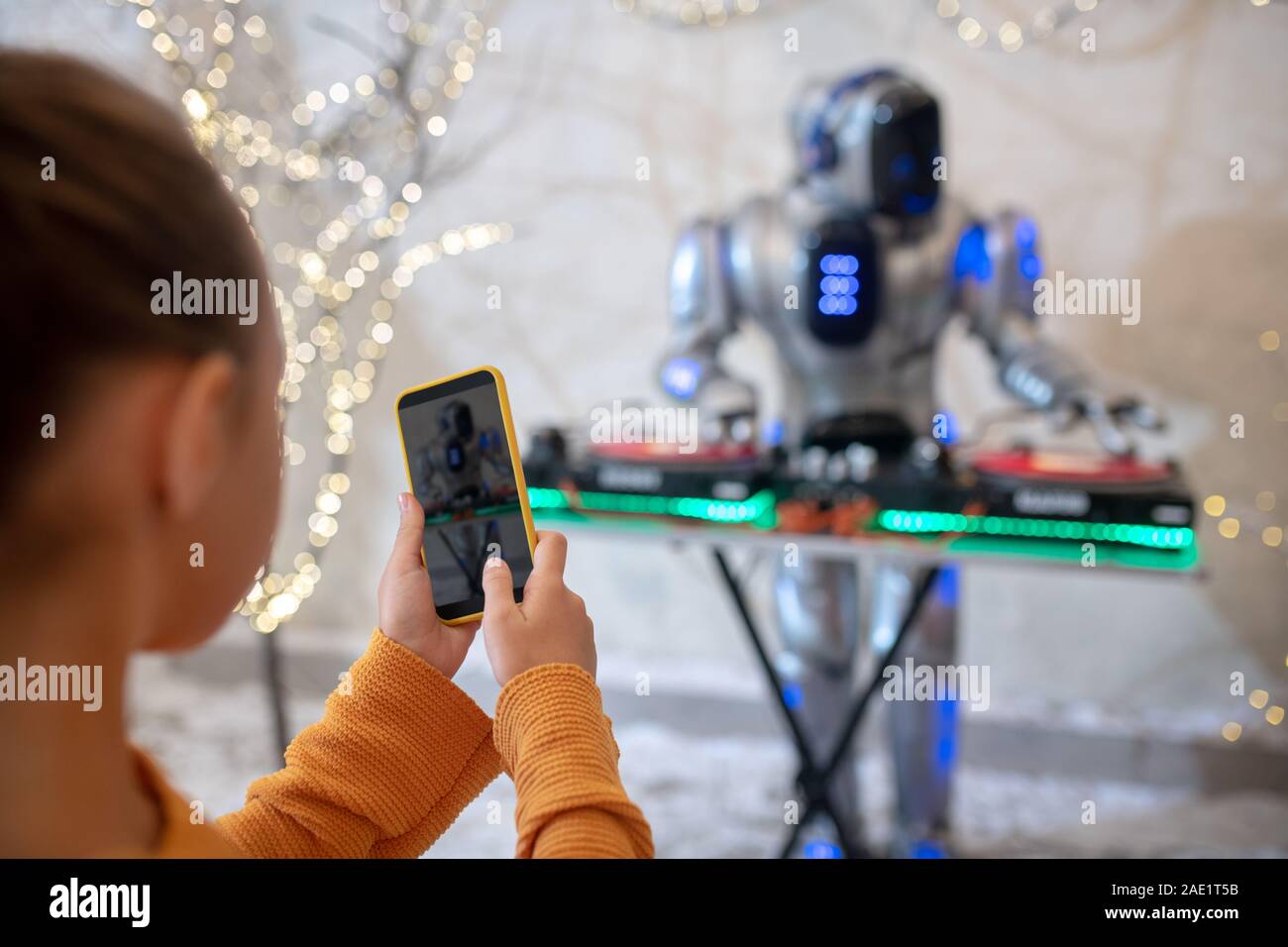 Robot dj getting ready for the new year party Stock Photo - Alamy