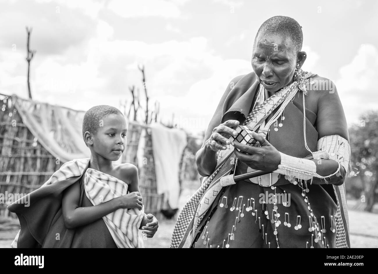 Same, Tanzania, 7th June 2019: maasai woman with a rubics cubic Stock Photo