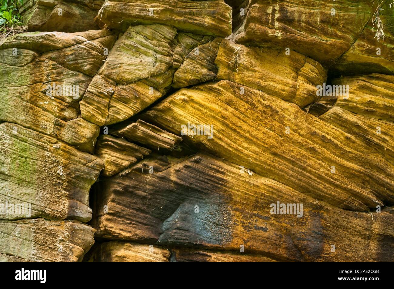 Exposed fluvial sandstone beds in an old quarry in Ravenfield near Rotherham, showing cross-bedding. Stock Photo