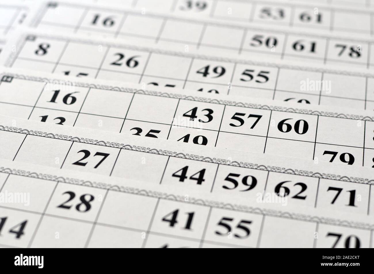 Board old lotto game with wooden elements. Bingo cards. Background
